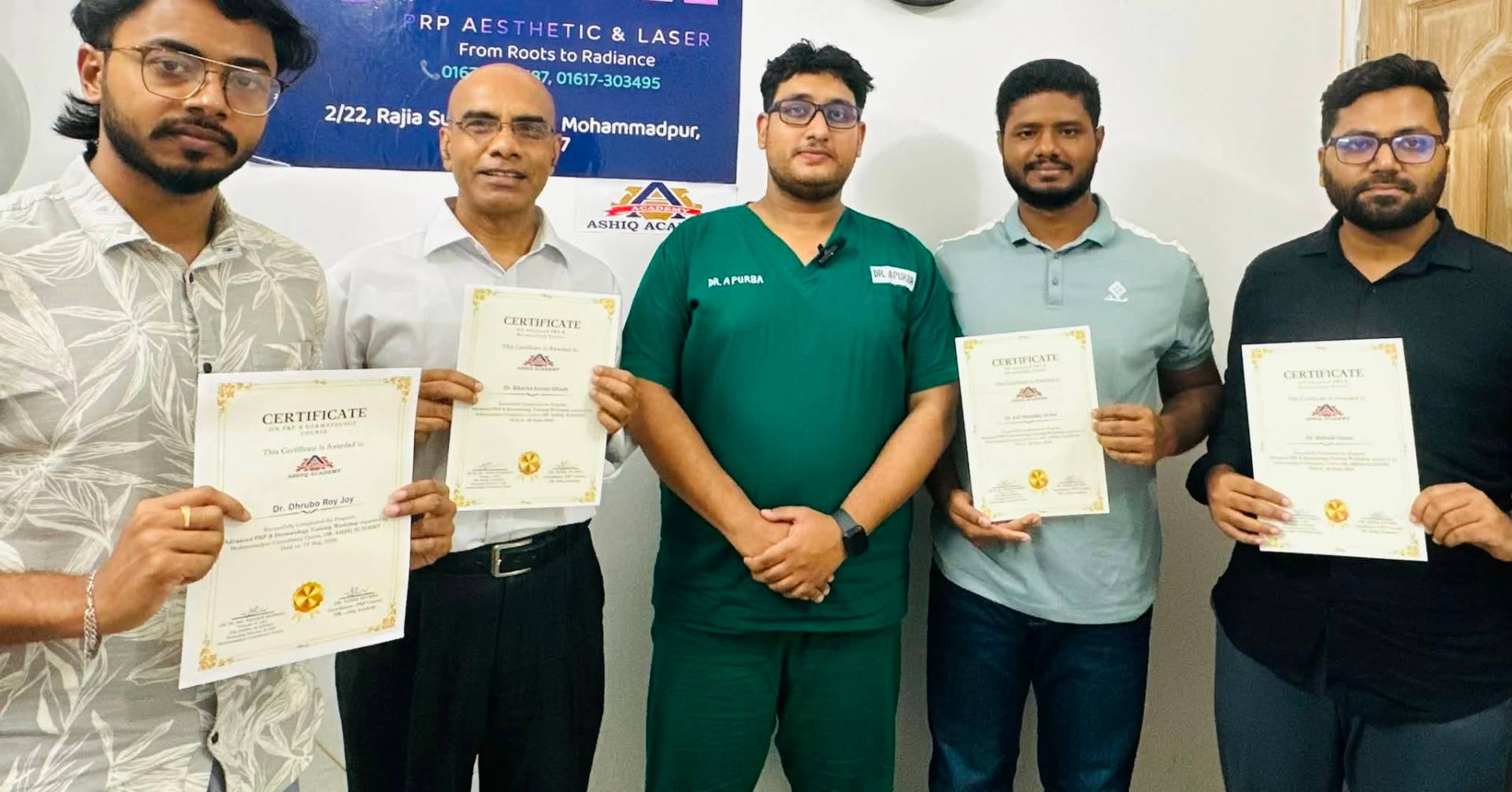 Doctors receiving certificates